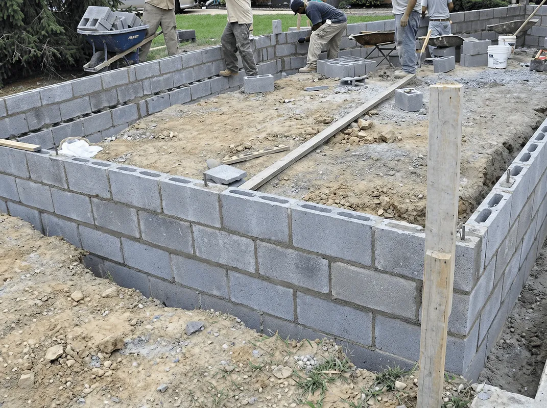 Professionals building a foundation with blocks in Cape Coral, FL
